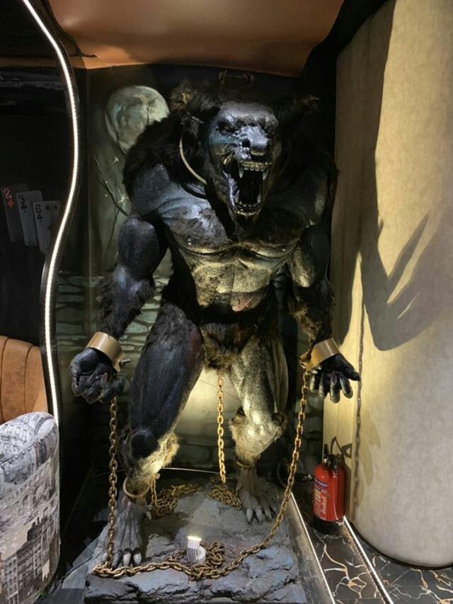 Large creature sculpture installation by Liger Art